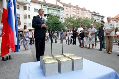 President of the Republic of Slovenia, Dr Danilo Trk, attended a ceremony on the unveiling of the 'Memorial Cobblestones', where he symbolically laid the last cobblestone commemorating Holocaust victims in Maribor (photo: Stanko Gruden/STA)