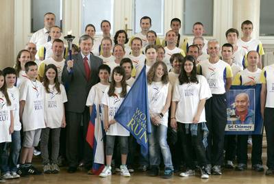 Slovenian President Dr Danilo Trk receives the international team of runners of the World Harmony Run (photo: Tina Kosec/STA)