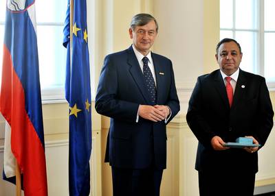 Slovenian President Dr Danilo Trk confers the Order of Merits on Mohammad Al-Khashman (photo: Tamino Petelinek/STA)