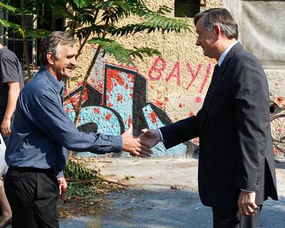 Predsednik republike dr. Danilo Trk je obiskal Socialni center Rog, kjer se je sreal z aktivisti Nevidnih delavcev sveta (foto: Stanko Gruden/STA)