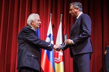 19. 12. 2022, Slovenske Konjice – Predsednik republike je Florjanu Janiu vroil medaljo za zasluge za pomemben prispevek k slovenskemu prostovoljnemu gasilstvu in za ohranjanje ter varovanje gasilske dediine (Neboja Teji/STA)